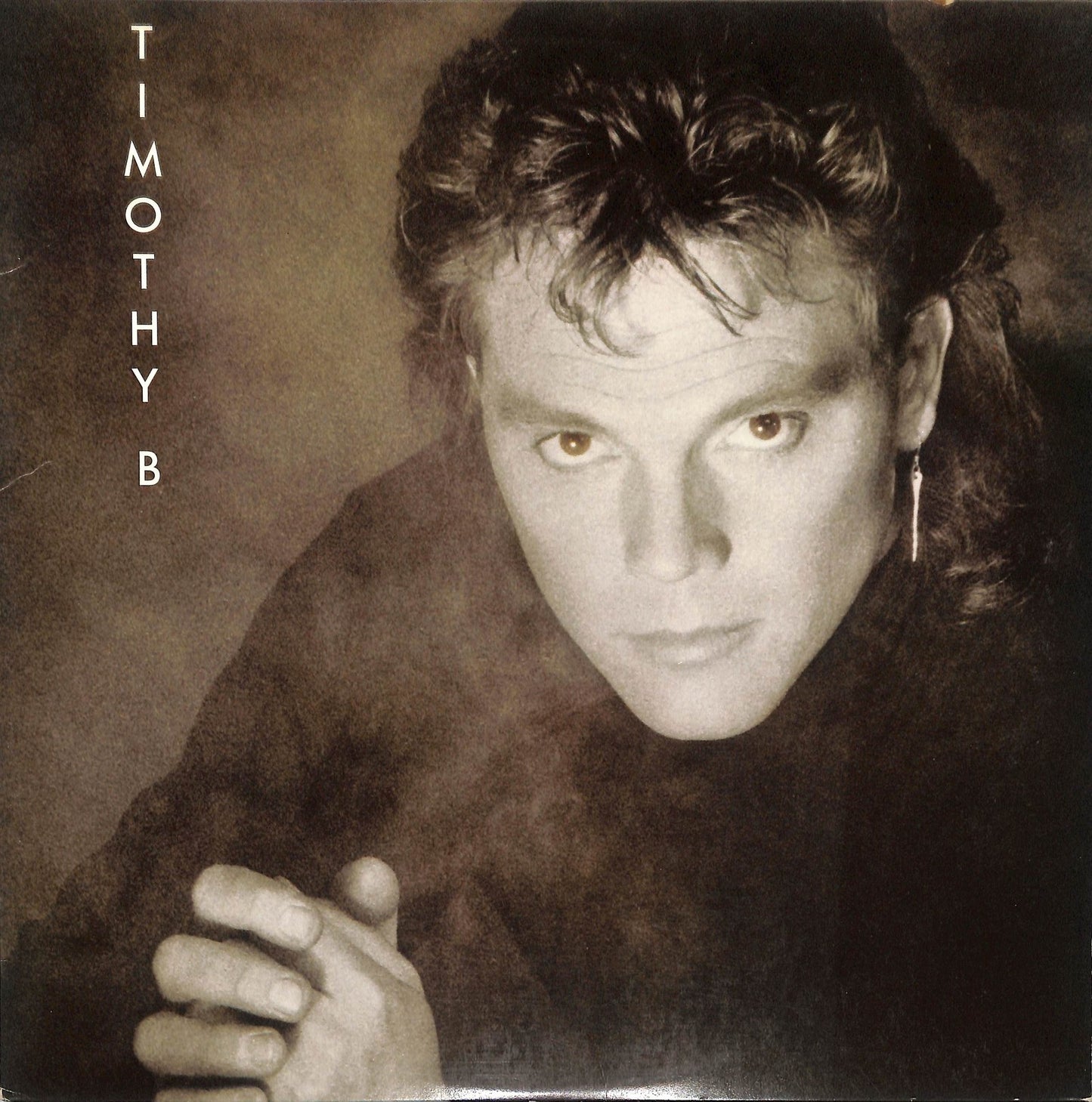 TIMOTHY B. SCHMIT - Timothy B